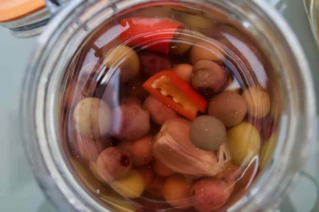 Olives brining in kilner jar - Pollensa Private Chefs